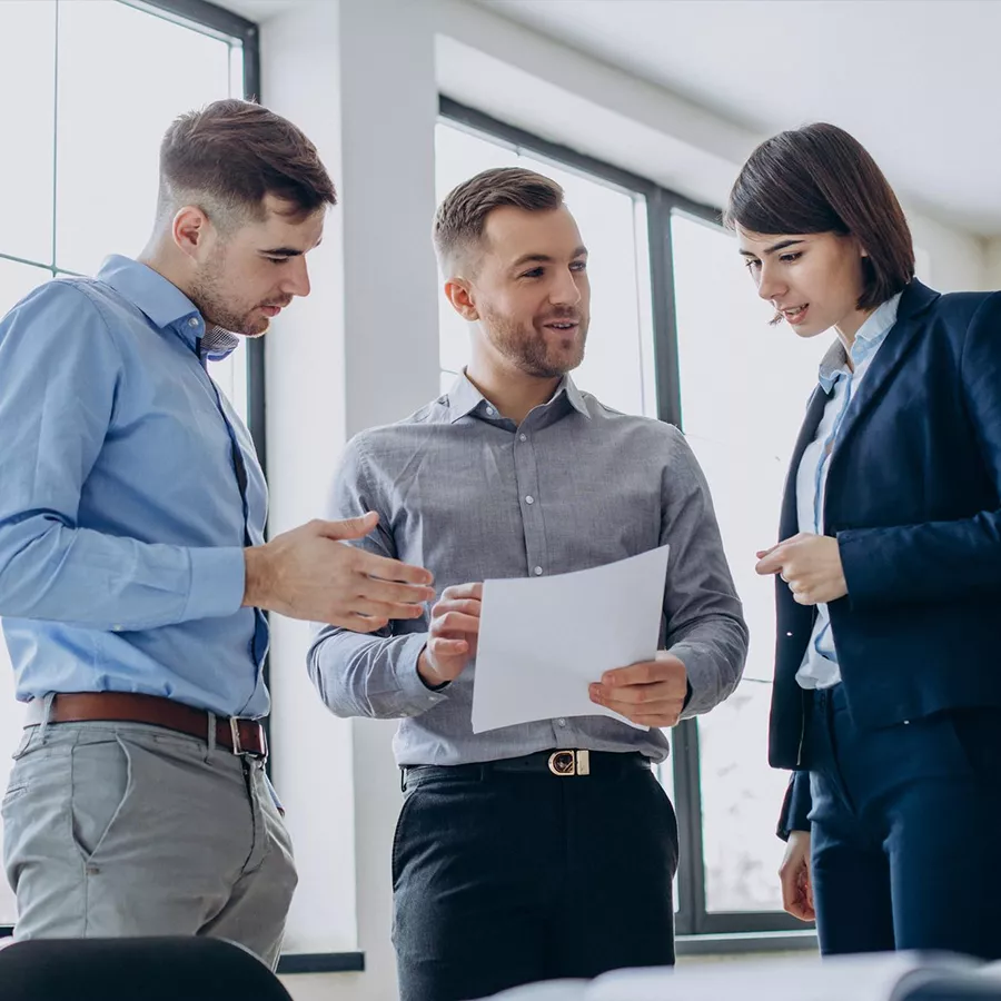 Entrepreneurs discussing company setup in Saudi Arabia